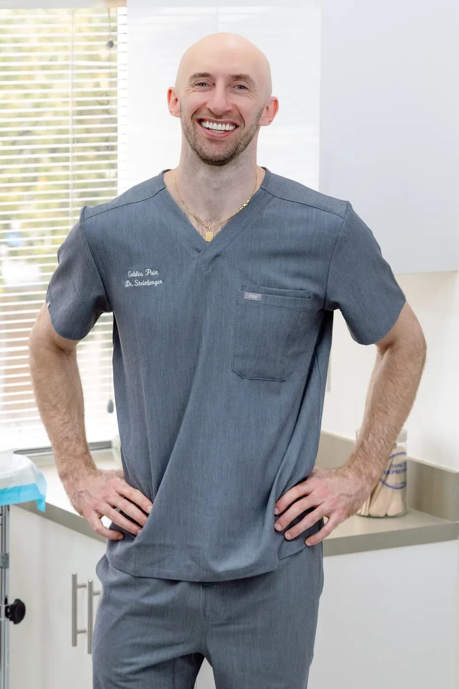 Dr. Tristan Steinberger in Gables Pain scrubs at the Coral Gables office