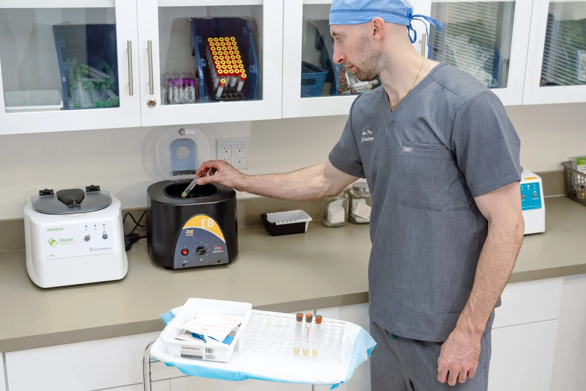 Dr. Steinberger preparing platelet-rich plasma at the centrifuge in the Coral Gables office