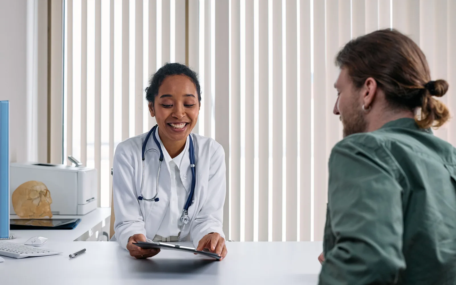 Physician and patient talking during a consultation